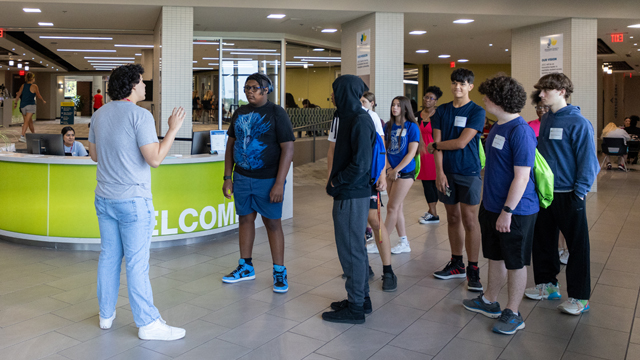 a cav leader leads group tour for a visit event on the campus of JCCC