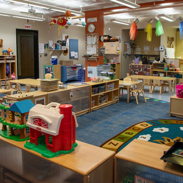 Young Preschool Classroom, showing circle area, art area, and quiet area. 